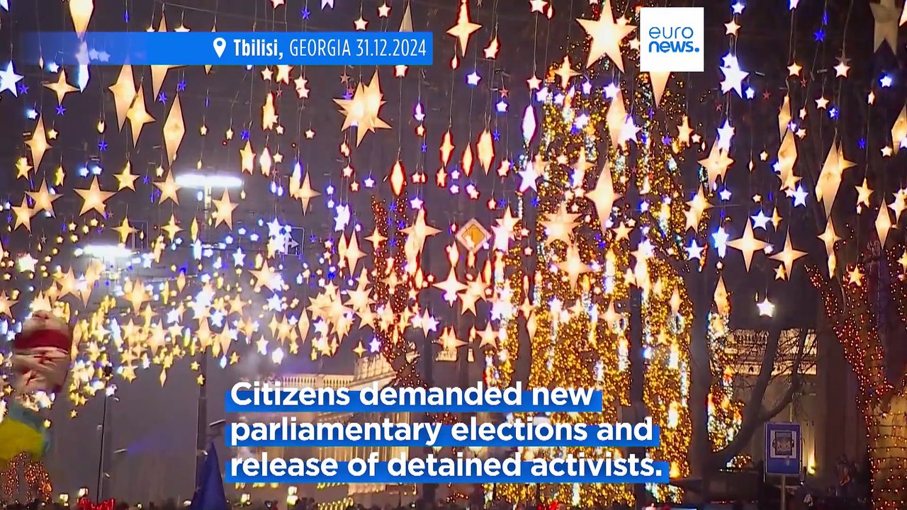 Tens of thousands take to the streets of Tbilisi in anti-government protests on New Year's Eve
