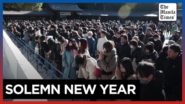 Japanese pray for a peaceful new year at Tokyo's Meiji Shrine