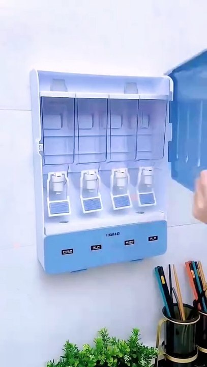 Wall mounted liquid oil dispenser