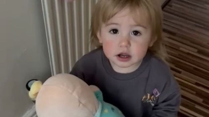 Toddler reacts with joy to fans singing at Fratton Park