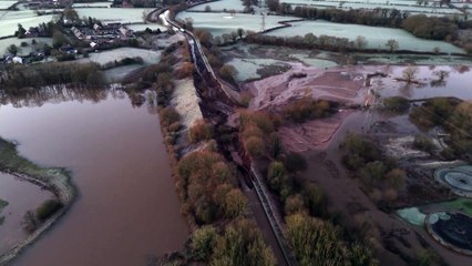 Torrential rain causes canal to burst in Greater Manchester