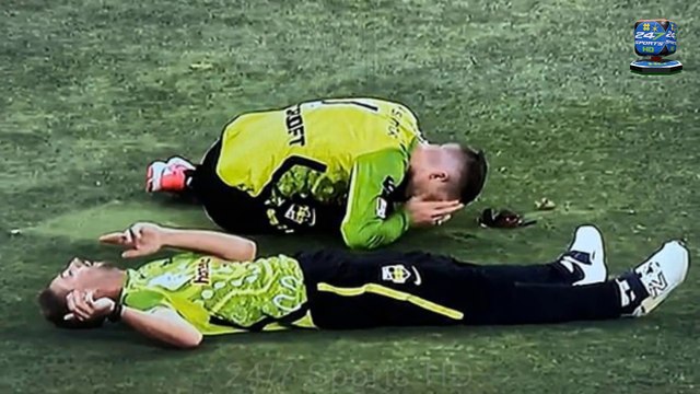 Toe-curling moment two cricketers smash into each other while fielding in a Big Bash League match... with one worryingly carried off on a stretcher