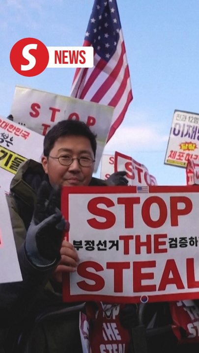Thousands brave freezing weather to rally for and against impeached president Yoon