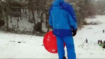 Daredevils sledge down Hill 60 at Roundhay Park in Leeds after heavy overnight snow