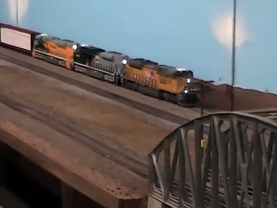 Ho scale MTH Union Pacific SD70ACe leads two MTH Heritage SD70ACes.