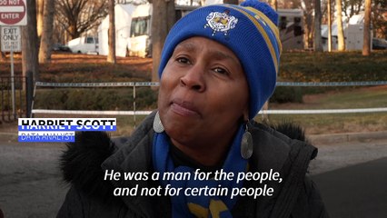 Mourners queue outside Carter Center to pay respects to late US president