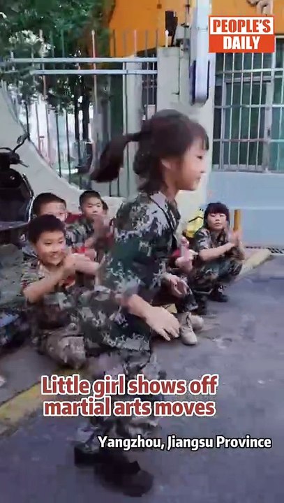 Cute and cool! Check oute this little girl,s spot-on metial arts routine ifront of a