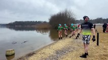 The five elves brave the cold, leading the charge for dozens of dippers in honour of Charlie Cosser