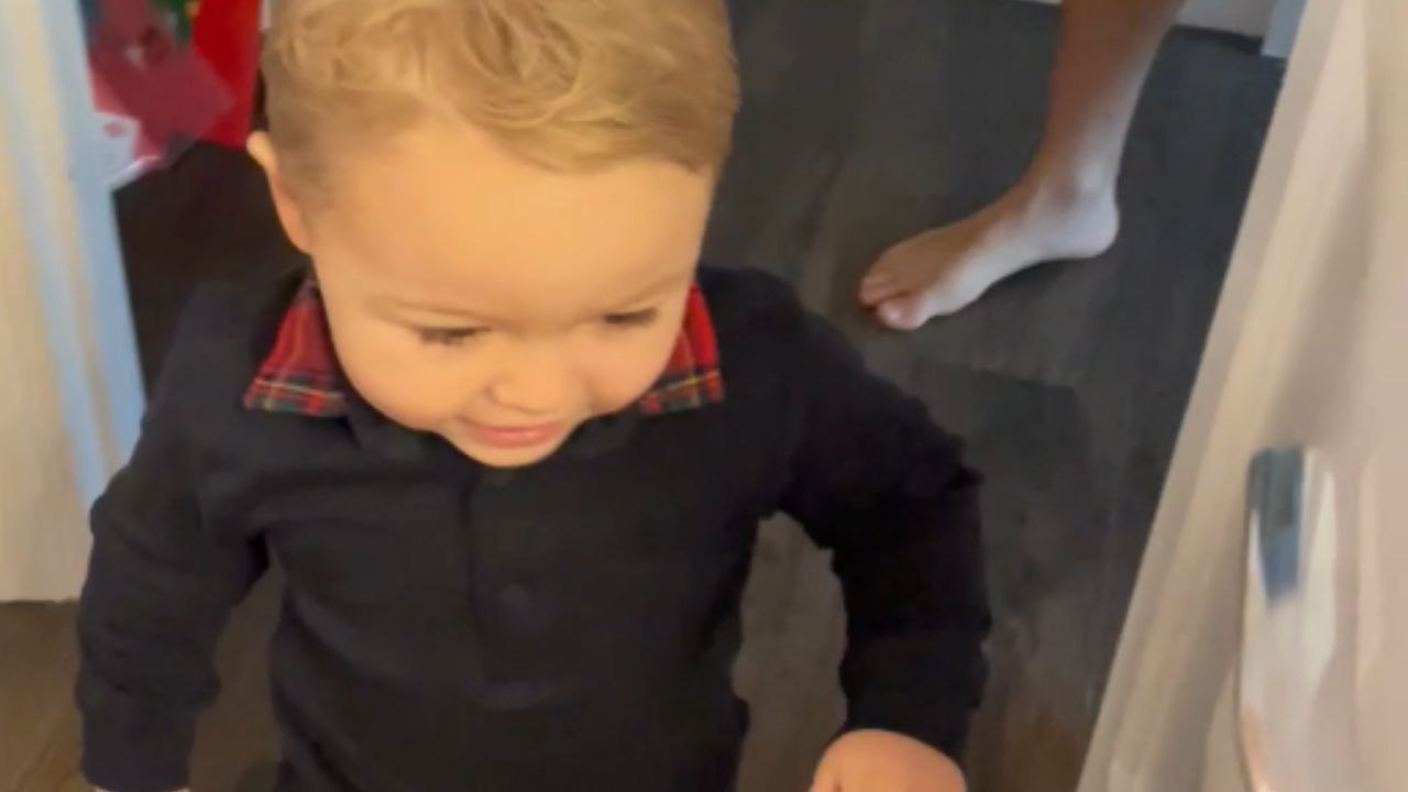 Little golfer's excitement soars as Santa delivers the perfect Christmas surprise