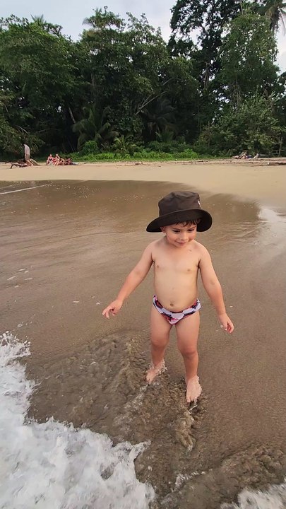 Toddler in the waves
