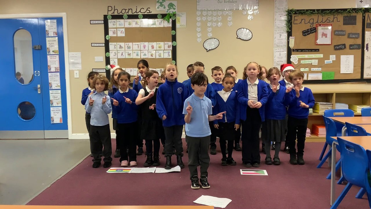 Schoolchildren sing Band Aid's 1984 hit for charity