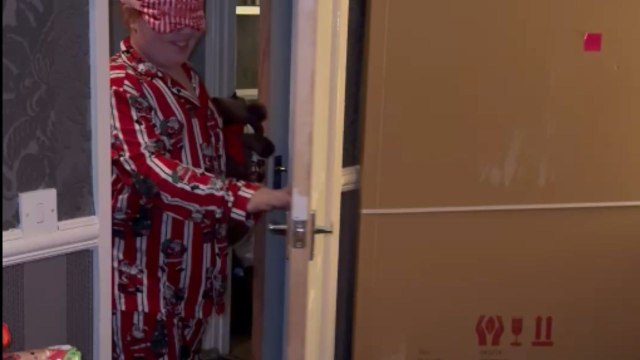 Heartwarming moment as girl discovers a room filled with Christmas gifts just for her
