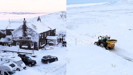 Farmer with snowplough frees guests trapped in Britain’s highest pub