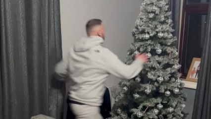 Holiday acrobat’s elf jump shatters the Christmas tree into two halves