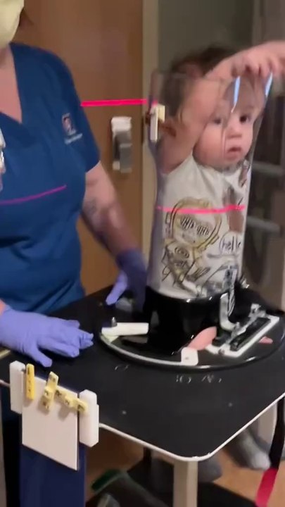 This little girl is stuck in a silicone pipe
