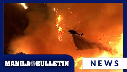 10,000 structures burn in LA’s 2 biggest wildfires