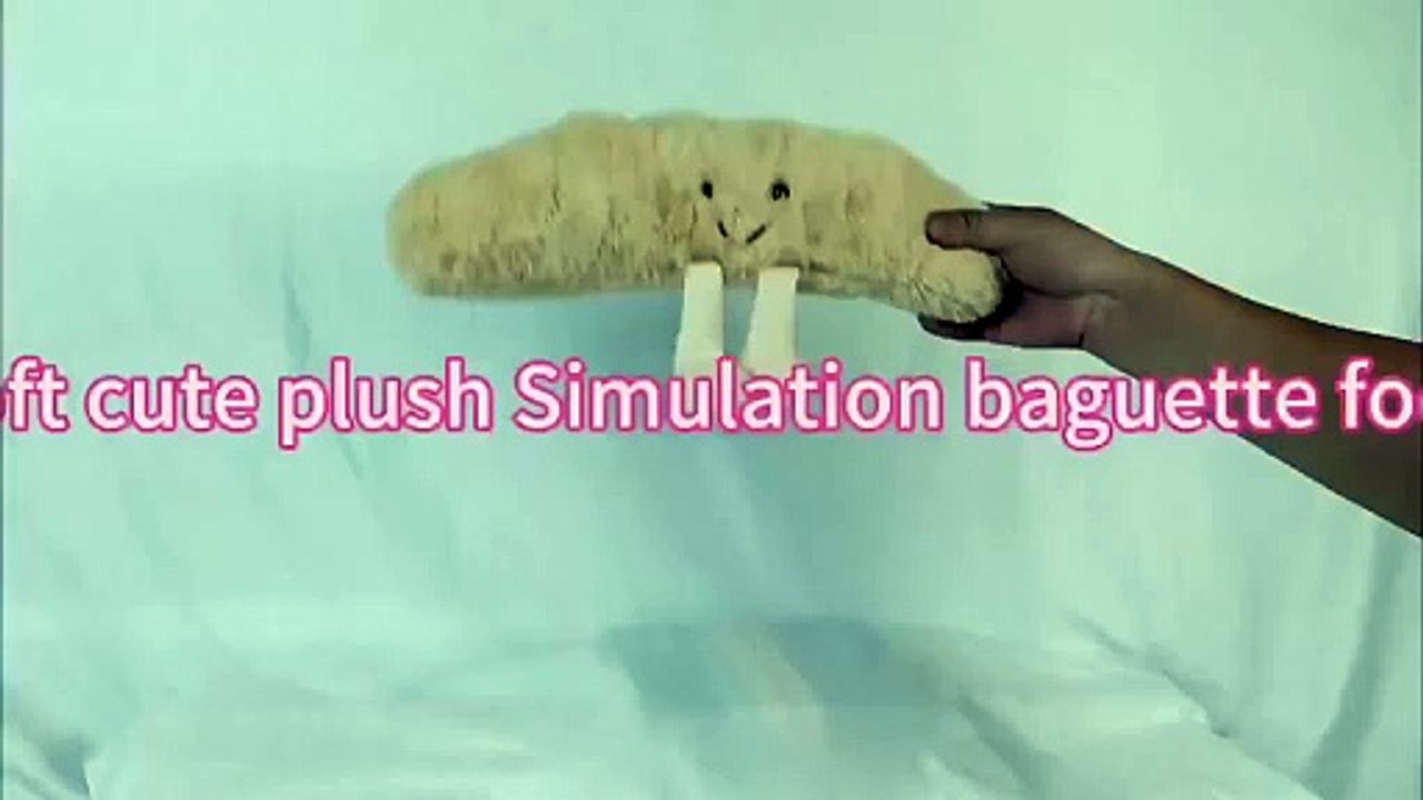 New design soft long plush cartoon baguette bread pillow stuffed baguette candy bag toy.