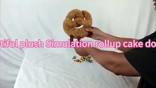 New design soft charming plush cartoon rollup bread pillow stuffed rollup candy bag toy.