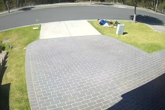 Boy Falls Face-First After Braking Too Hard on Bike