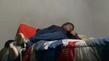 Prank on sleeping boy backfires when he wakes up and starts clapping