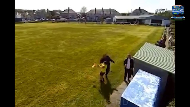 Shocking moment football coach, 43, punches teen linesman to the ground during 8-0 defeat – as thug avoids prison