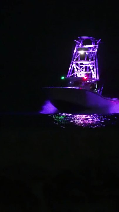 Amazing night capture of this power center console boat yesterday at the Haulover Inlet