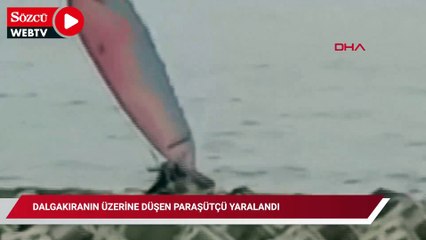 Dalgakıranın üzerine düşen paraşütçü yaralandı; o anlar kamerada