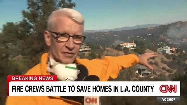 Anderson Cooper catches helicopters in active battle to save Topanga Canyon homes from wildfires
