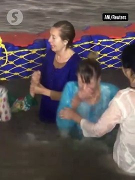 Millions take holy dip for absolution as India's Maha Kumbh Mela begins