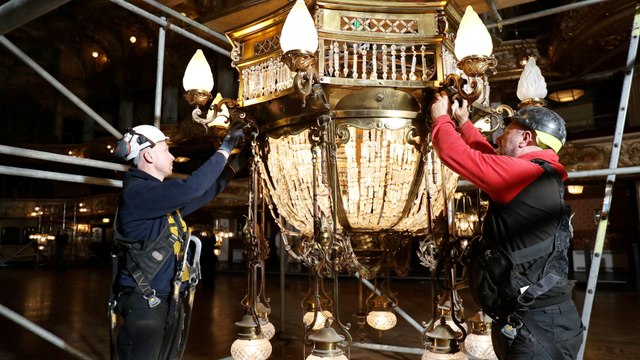 Workmen remove crystal chandeliers from Blackpool Tower ballroom for spring clean