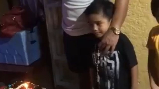 Lad screams while praying for the birthday boy and startles him