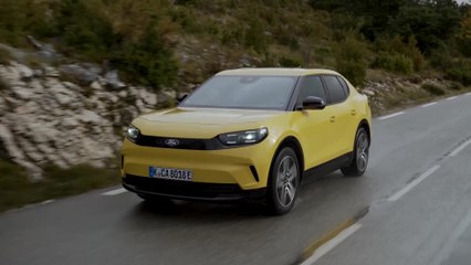 The new Ford all-electric Capri in Vivid Yellow Driving Video