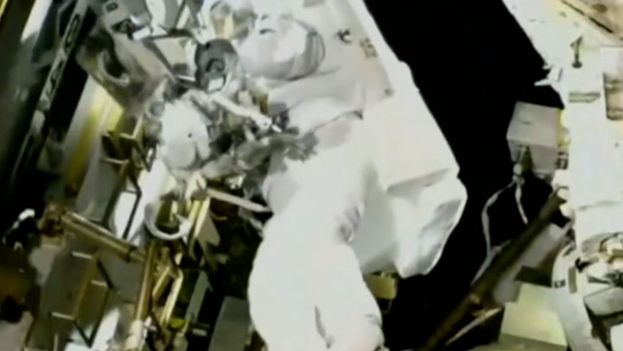 Nasa astronaut trapped in space ventures outside for first time in ...