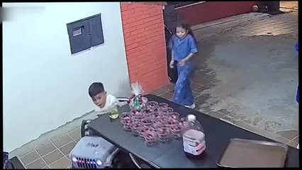 Boy Crashes Toy Car into Table Knocking Everything Over