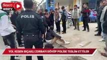 Yol kesen bıçaklı zorbayı dövüp polise teslim ettiler