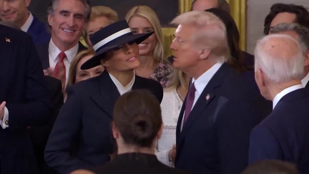 Watch awkward moment Donald Trump leans in for kiss with wife Melania Trump ahead of inauguration