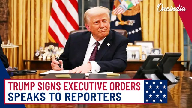 President Trump signs executive orders on his first day in office while addressing reporters