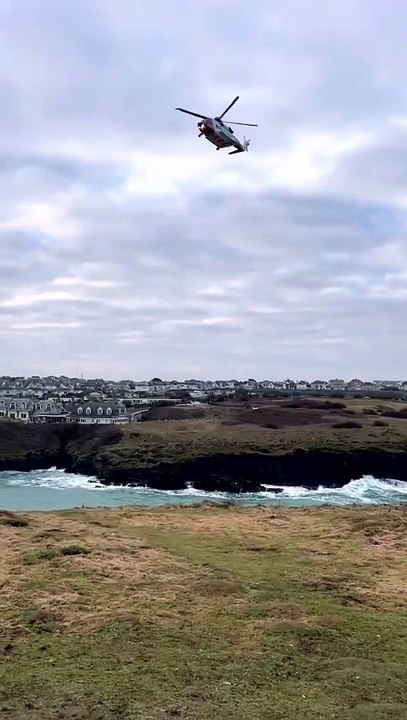The Coastguard Rescue Helicopter R924 seaches for a missing man at Porth Island