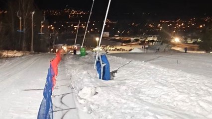 Rider thrown off snowmobile after high-speed hill climb goes wrong