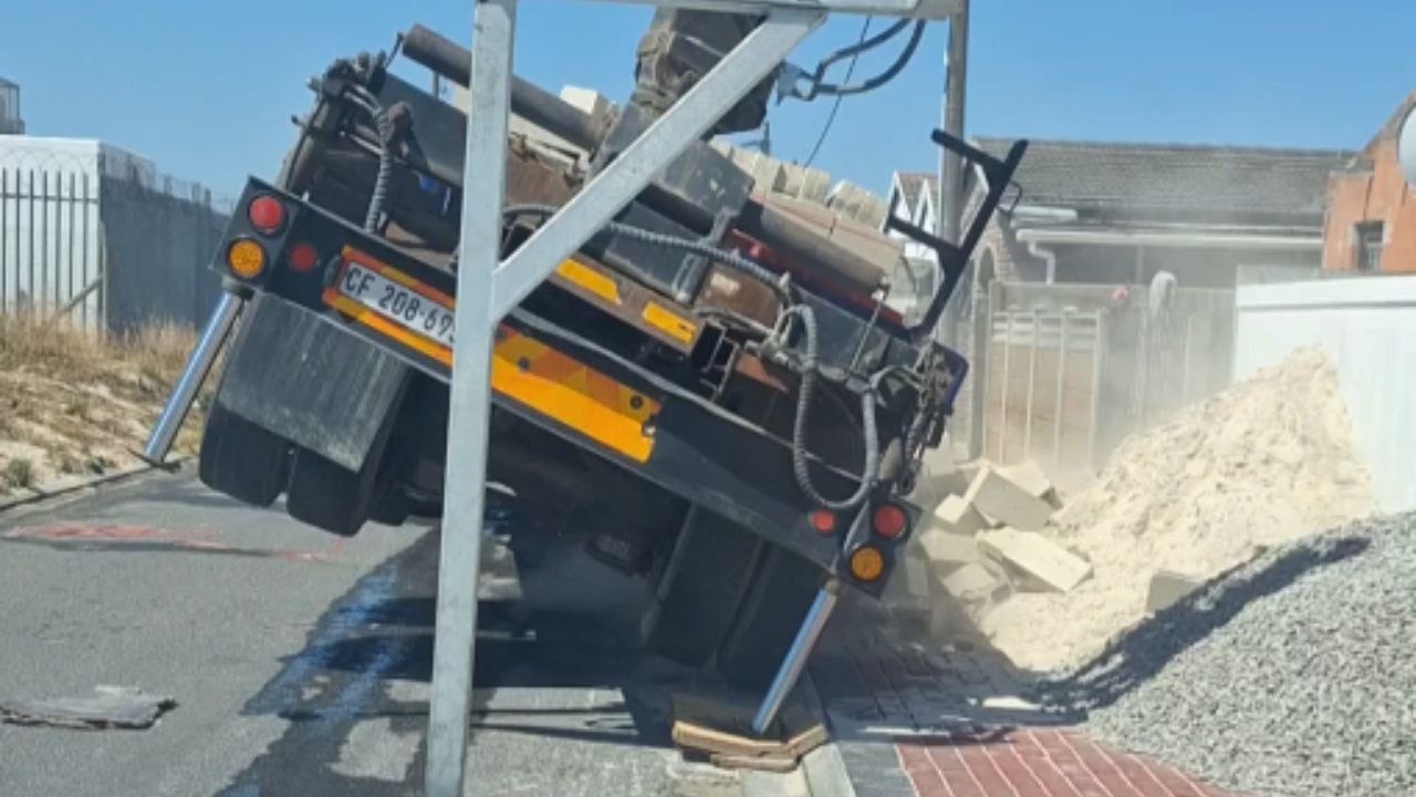 Worker gets flipped off truck and tries to turn fall into a smooth improvised act