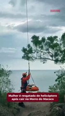 Mulher é resgatada de helicóptero ao cair no Morro do Macaco