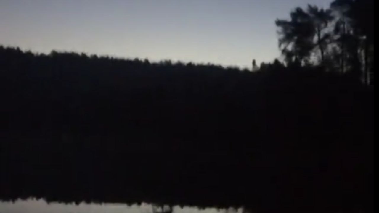 Daring camper experiences frozen tent and scenic early morning view