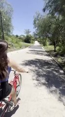 Woman Falls From Bike While Crossing Stream