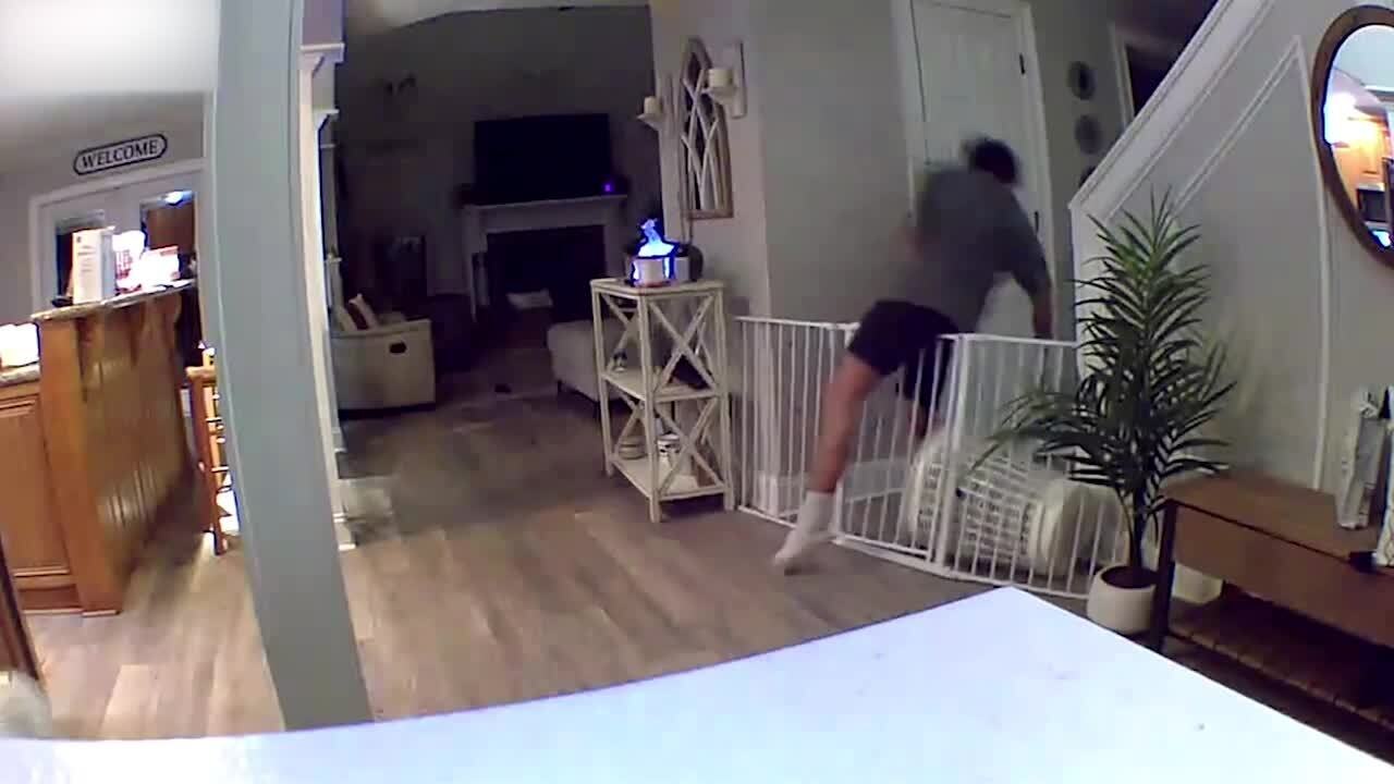 Man Trips on Pet Barrier