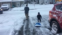 2-Year-Old Kid Helps Grandfather Shovel Ice