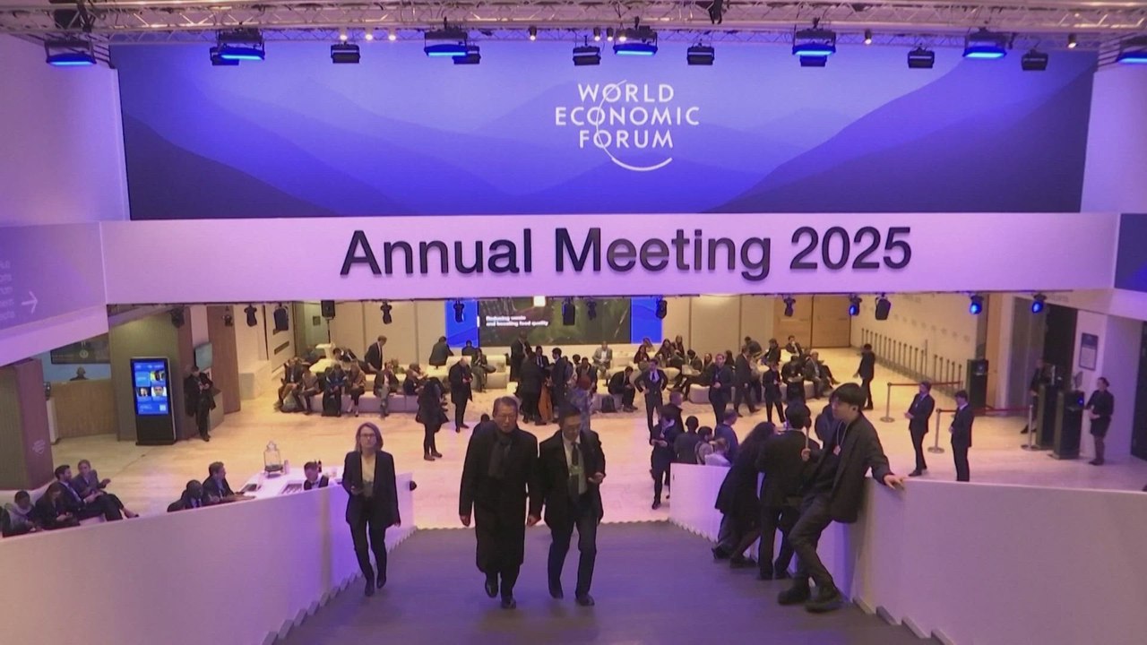Delegates at the World Economic Forum (WEF) reacting to U.S. President Donald Trump's speech to the WEF