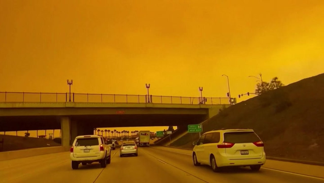 California sky turns apocalyptic orange as new Hughes Fire threatens Los Angeles