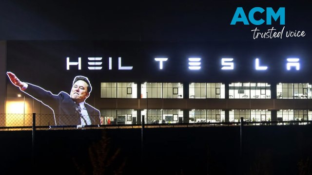 'Heil Tesla': Musk's straight-arm salute projected onto German Tesla factory
