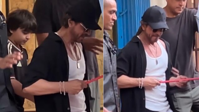 Shah Rukh Khan बेटे AbRam Khan के साथ हाथ में छतरी लिए आए नजर, देखिए किंग खान का शानदार लुक