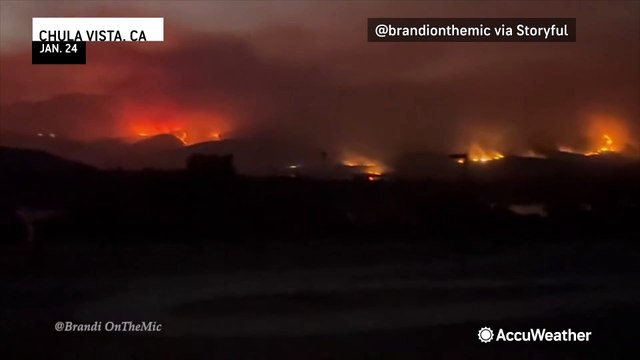 Firefighters battle the Border 2 Fire in San Diego County